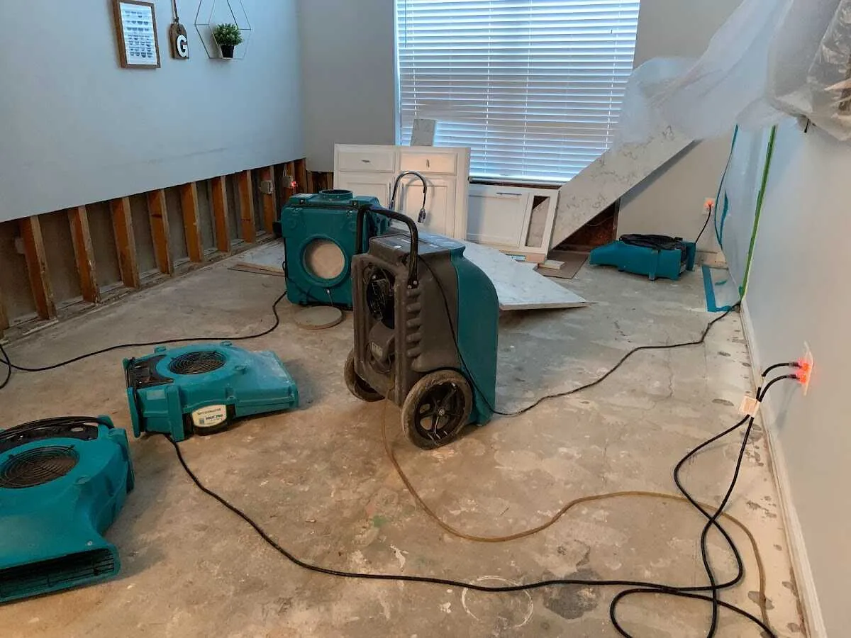 Dehumidifier in flood-cut room for Water Damage Restoration in Oak Park
